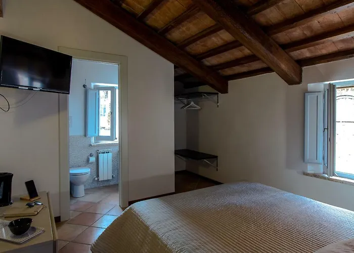 Santa Cecilia - Rooms&suite بيت ضيافة بيرودجا